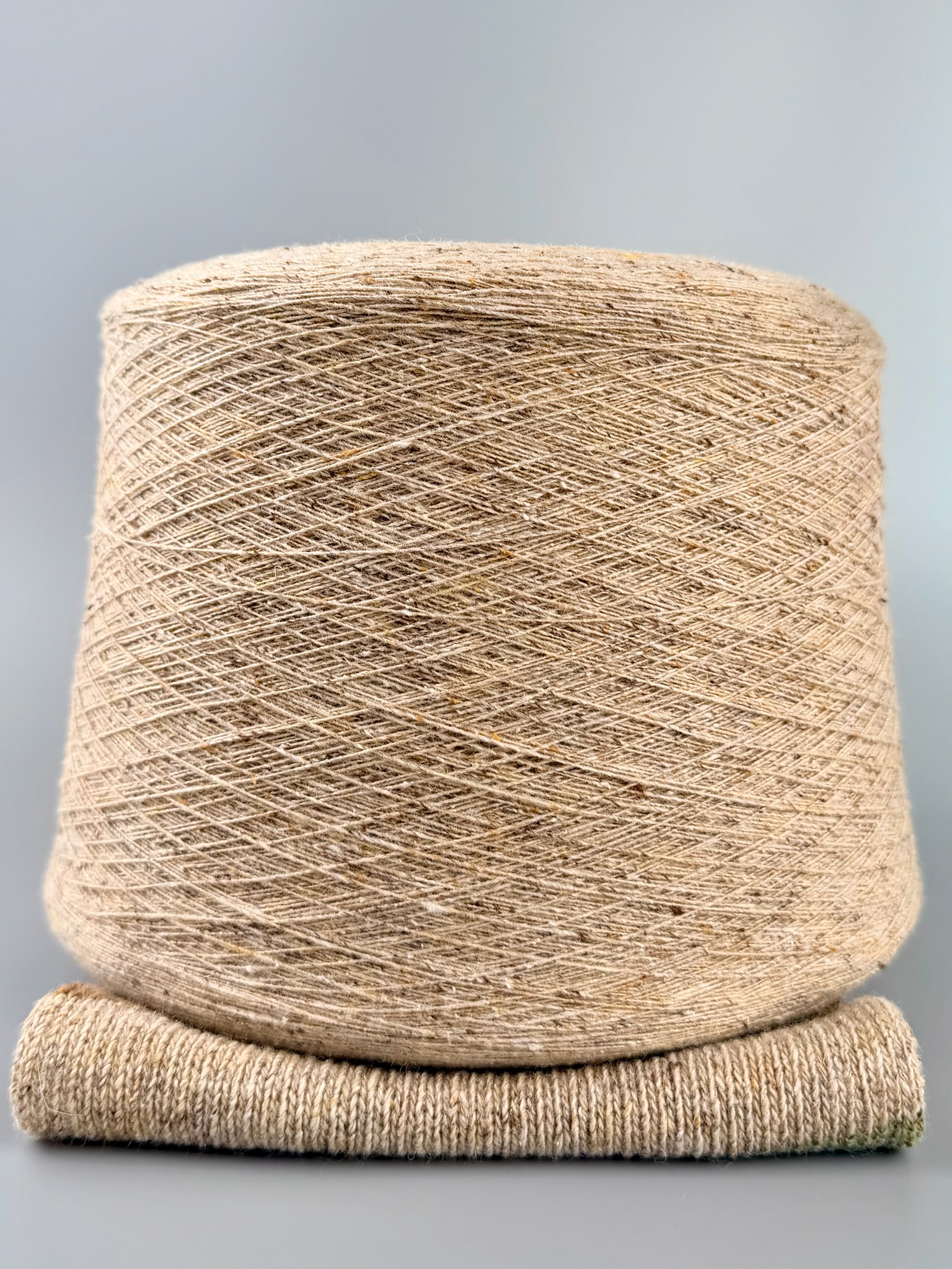 Zimpfer Wolle Selezione Art. Cardiff Tweed Nm 1/10500 – Merino Seide Garn col. Sandbeige foto 2